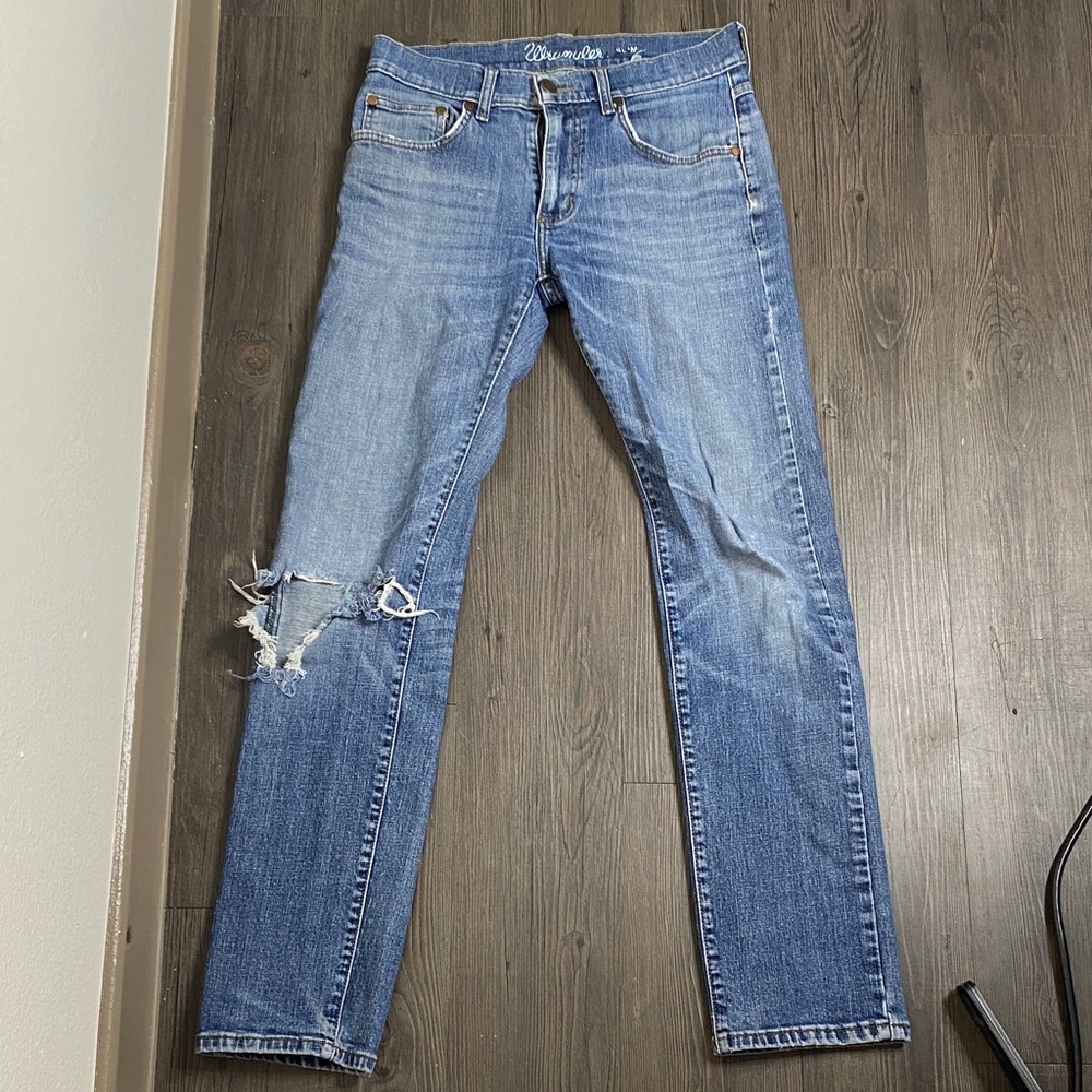 Wrangler blue slim denim jeans with ripped hole